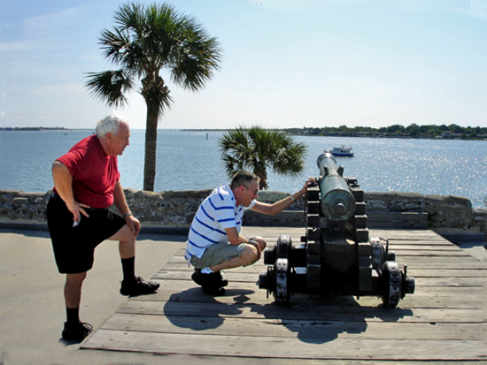 Brian Duquette studying the cannon